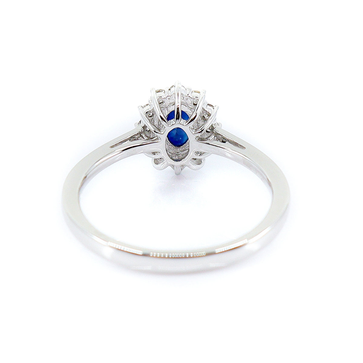 18ct White Gold Sapphire & 0.17ct Diamond Halo Ring