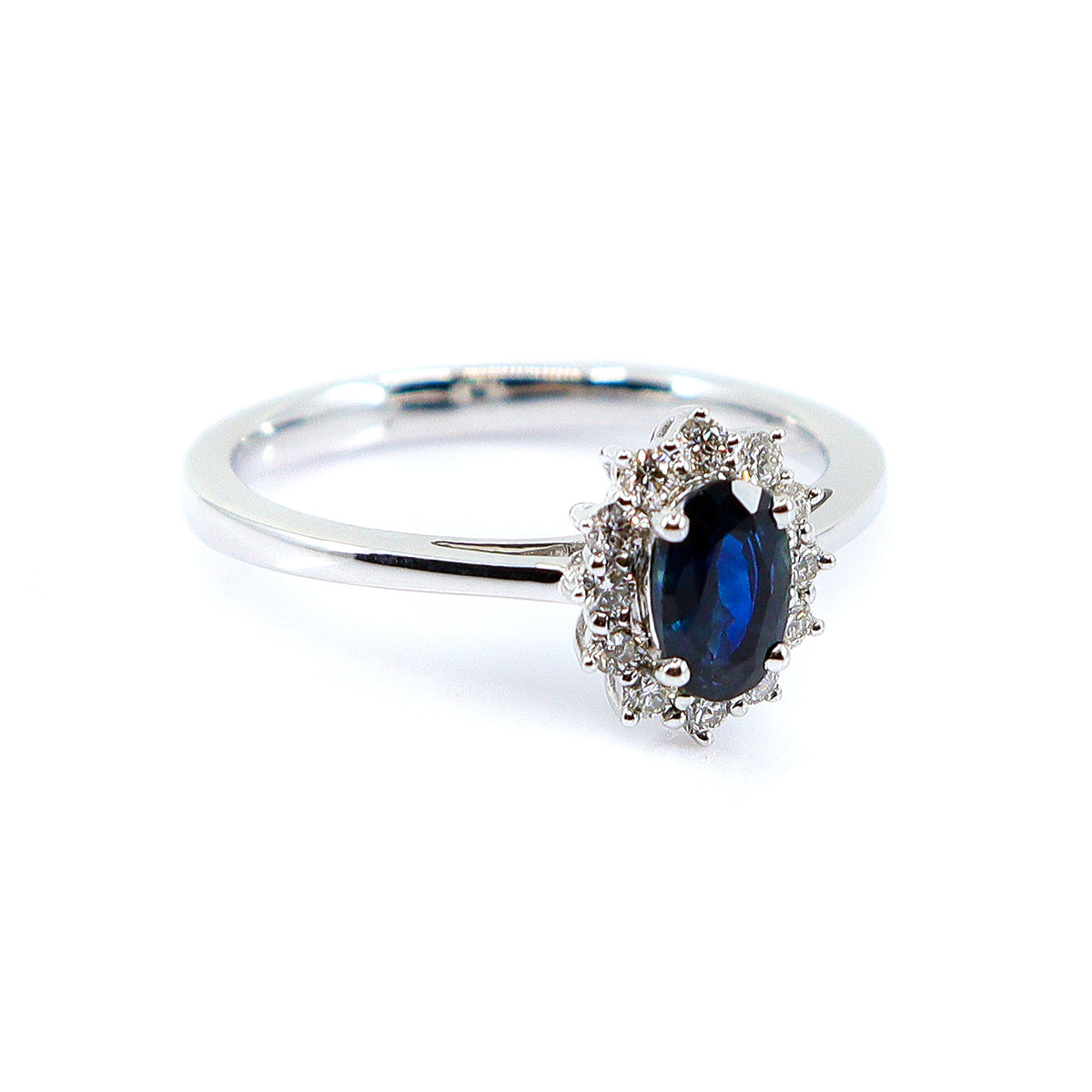 18ct White Gold Sapphire & 0.17ct Diamond Halo Ring