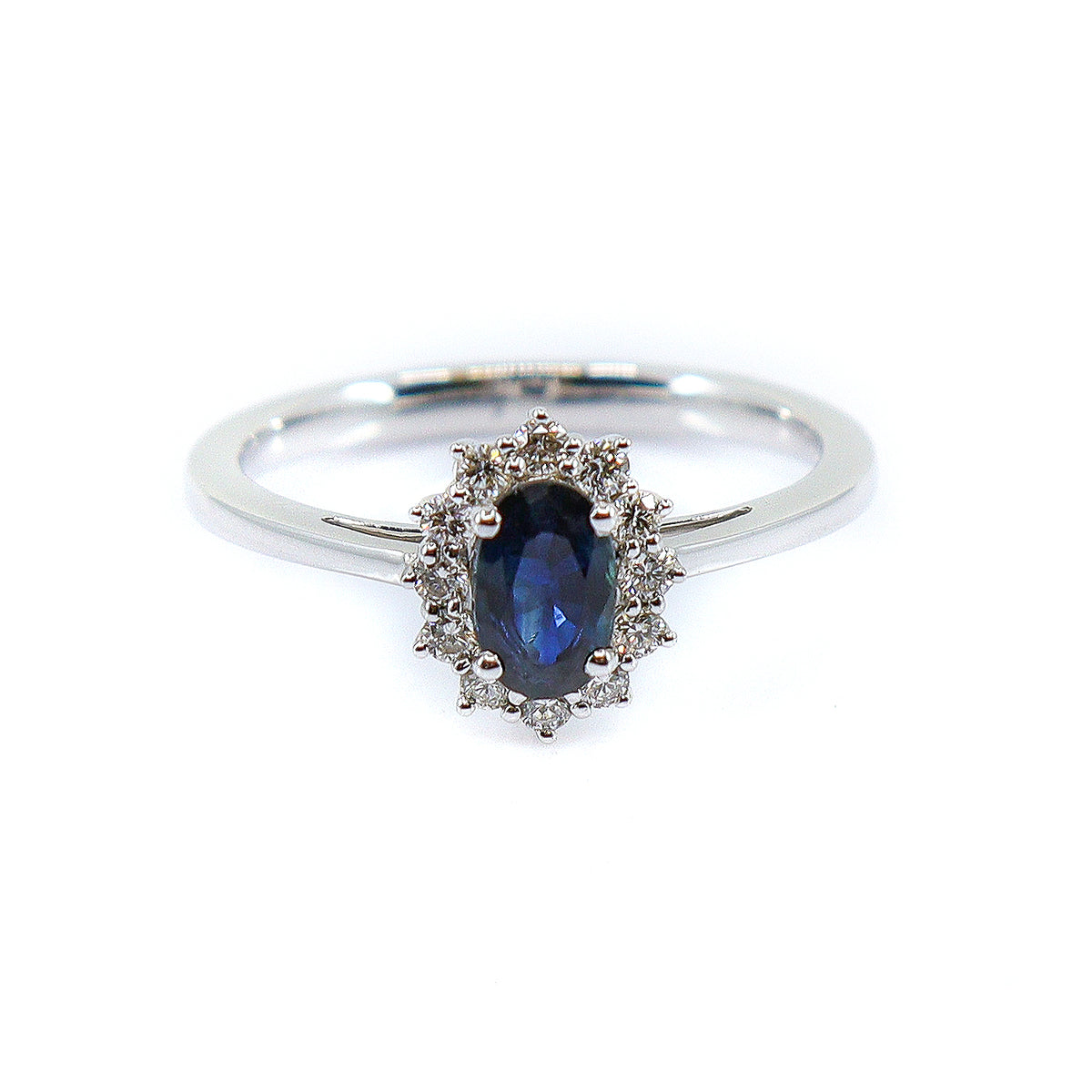 18ct White Gold Sapphire & 0.17ct Diamond Halo Ring