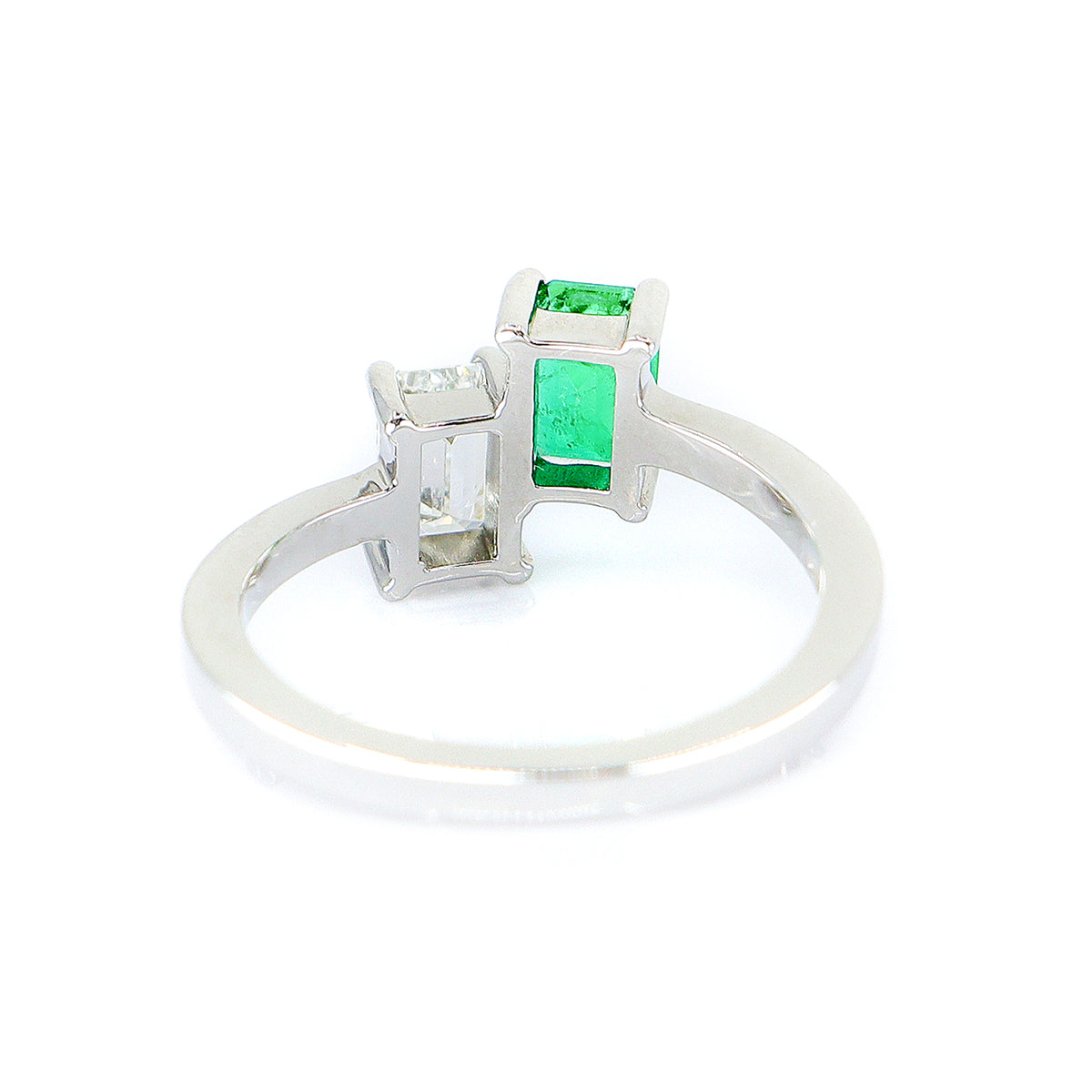 Platinum Emerald & Diamond Emerald Cut Two Stone Ring